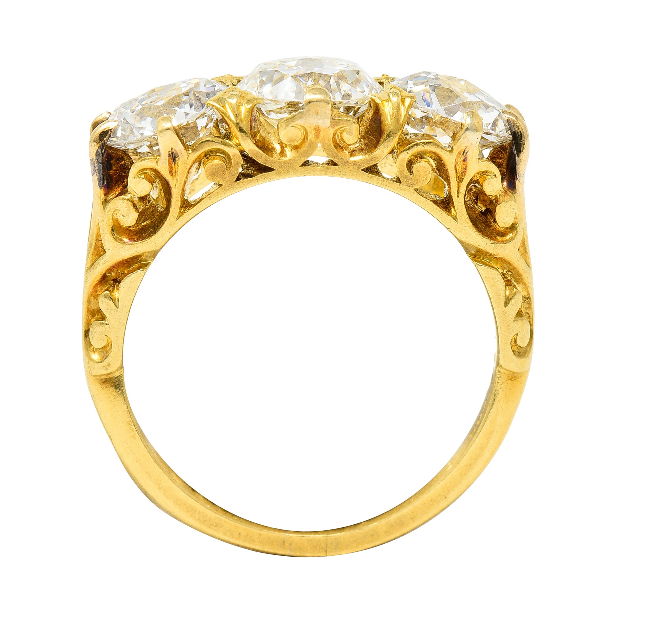 T.B. Starr Victorian 2.64 CTW Jubilee Cut Diamond 18 Karat Yellow Gold Fleur-De-Lis Three Stone Antique Alternative Band Ring Wilson's Estate Jewelry