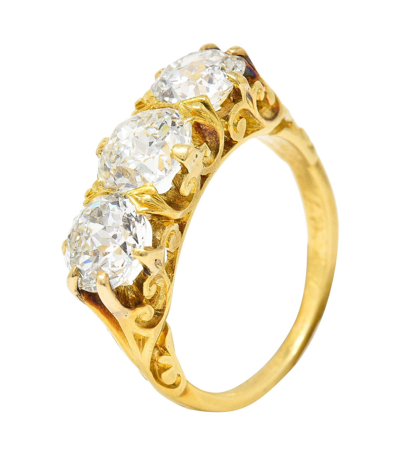 T.B. Starr Victorian 2.64 CTW Jubilee Cut Diamond 18 Karat Yellow Gold Fleur-De-Lis Three Stone Antique Alternative Band Ring Wilson's Estate Jewelry