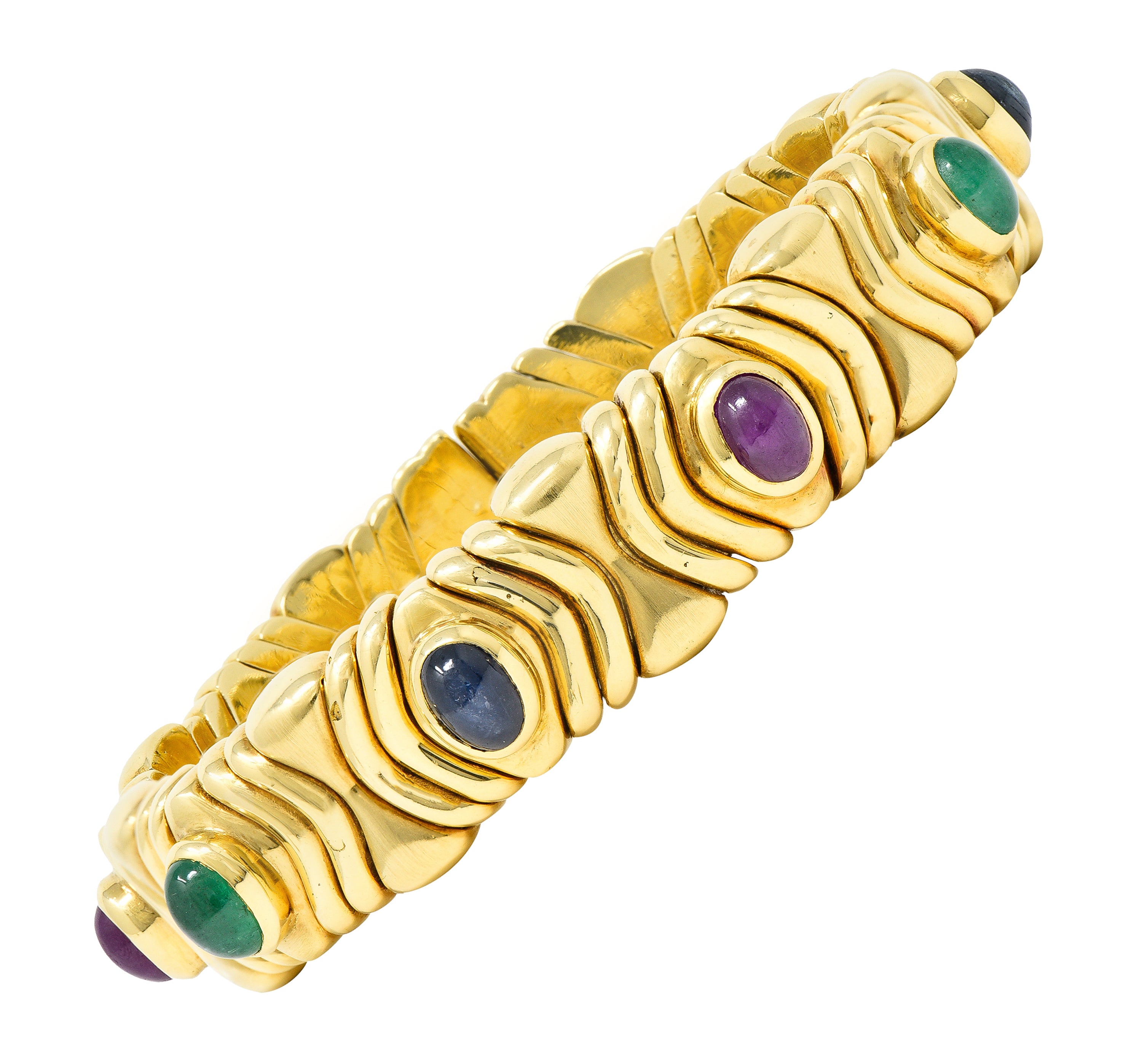 Bulgari 1980's Ruby Sapphire Emerald Cabochon 18 Karat Yellow Gold Tubogas Parentesi Vintage Cuff Bracelet Wilson's Estate Jewelry