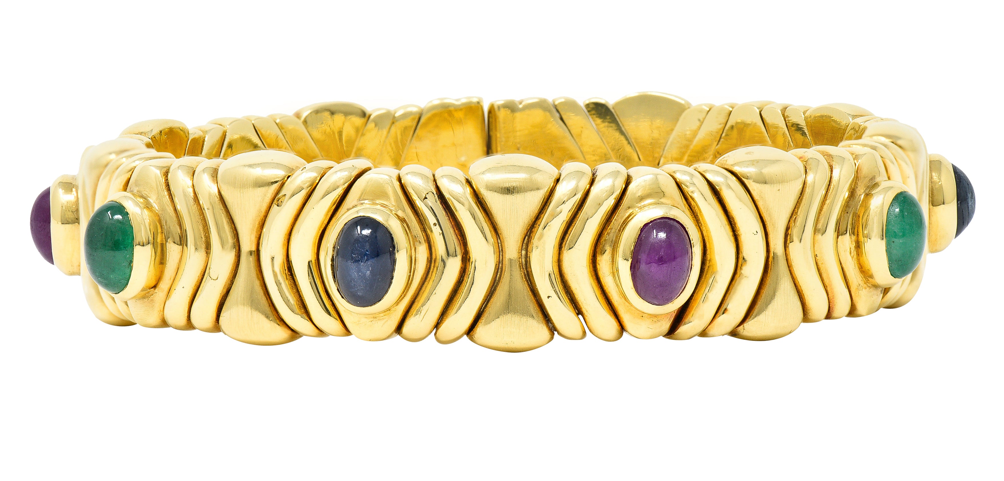 Bulgari 1980's Ruby Sapphire Emerald Cabochon 18 Karat Yellow Gold Tubogas Parentesi Vintage Cuff Bracelet Wilson's Estate Jewelry