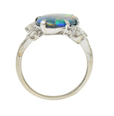1950's Black Opal Diamond 14 Karat White Gold Scrolling Navette Bypass Ring