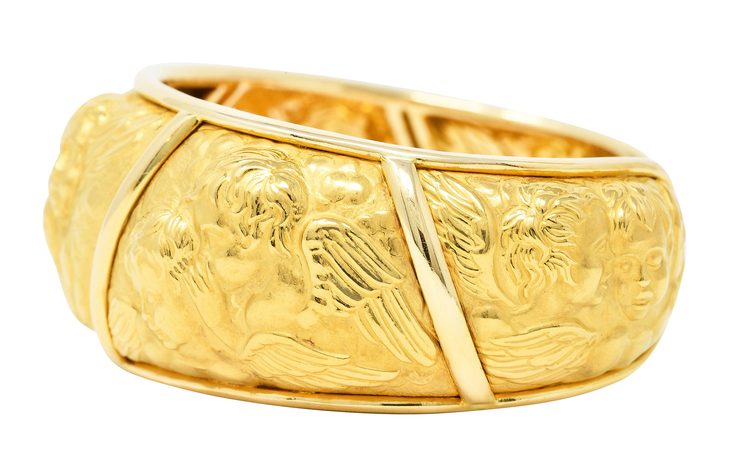 Carrera y Carrera 1990's 18 Karat Yellow Gold Repoussé Cherub Vintage Cuff Bracelet Wilson's Estate Jewelry