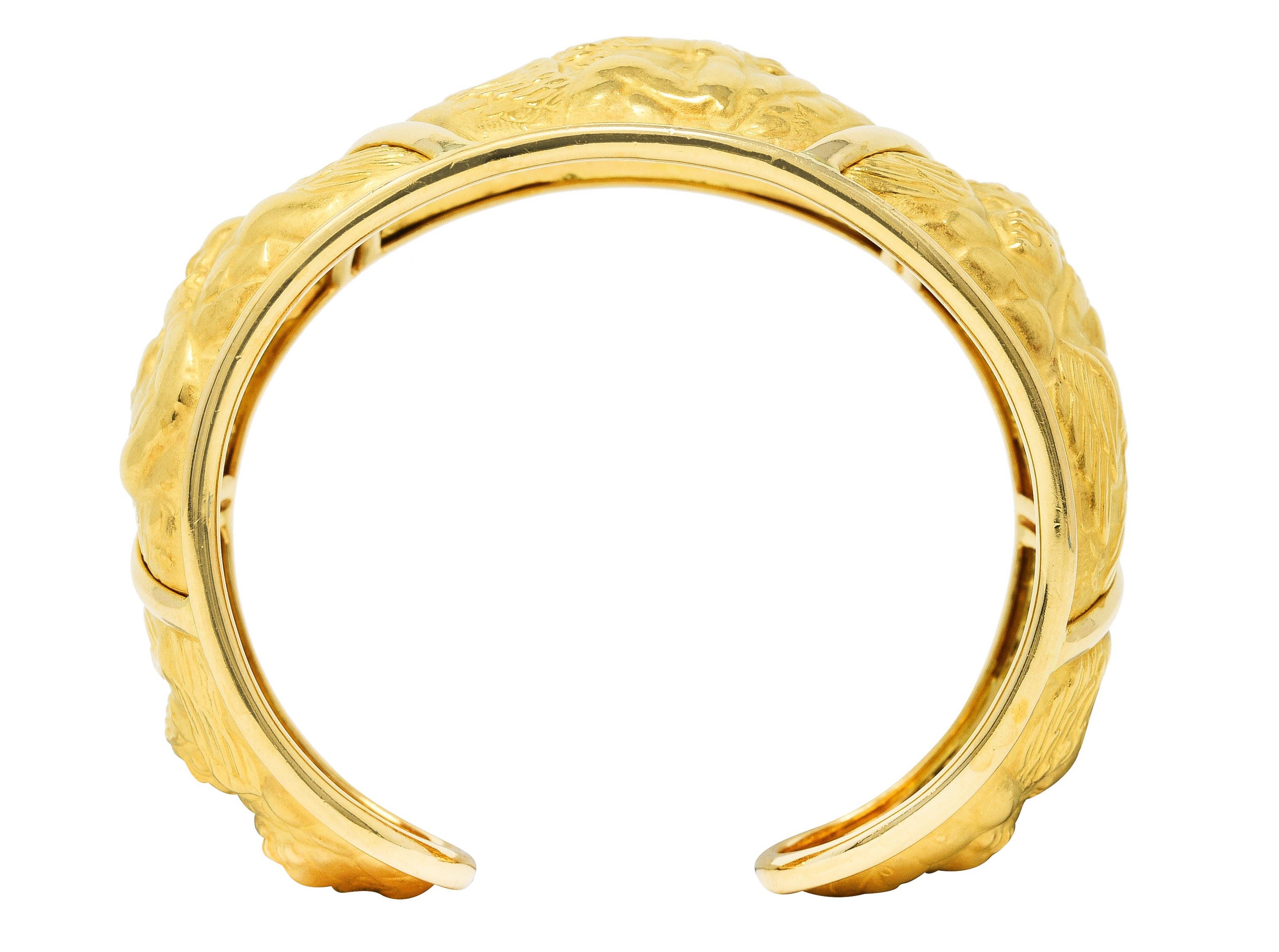 Carrera y Carrera 1990's 18 Karat Yellow Gold Repoussé Cherub Vintage Cuff Bracelet Wilson's Estate Jewelry