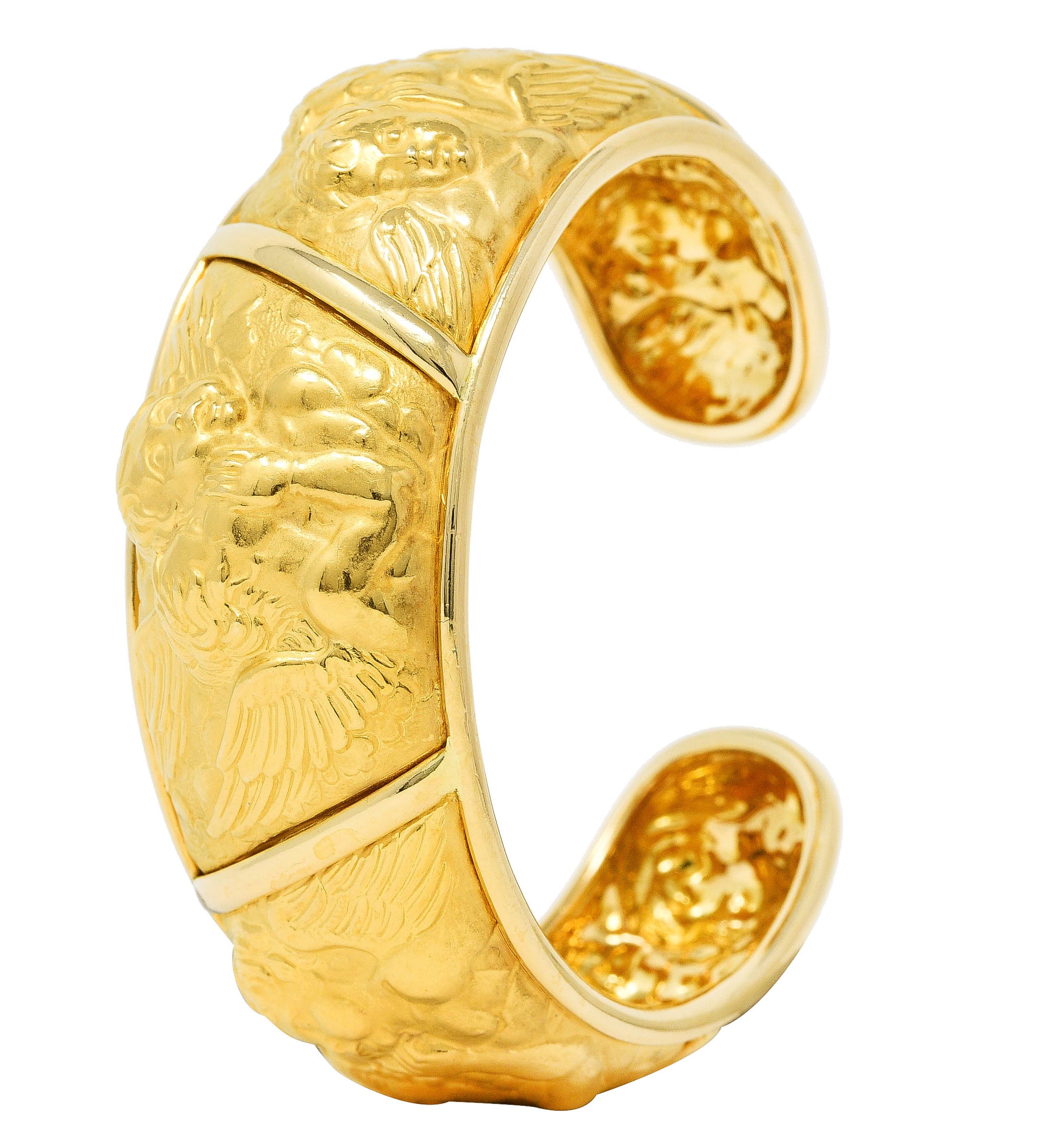 Carrera y Carrera 1990's 18 Karat Yellow Gold Repoussé Cherub Vintage Cuff Bracelet Wilson's Estate Jewelry