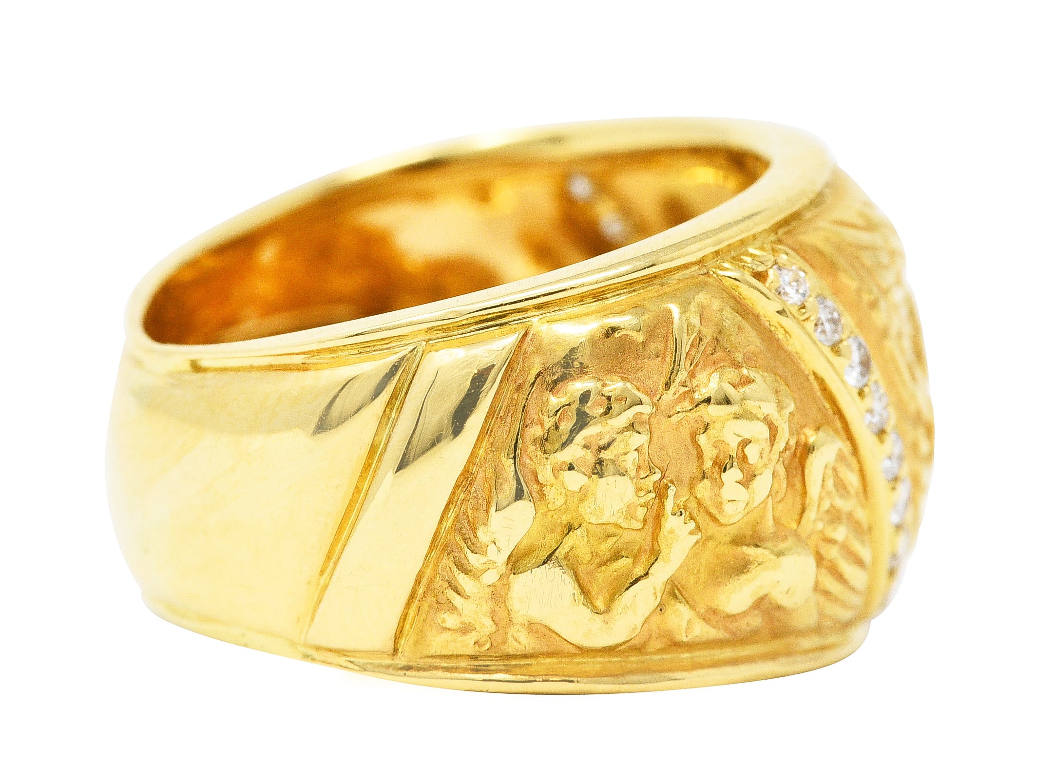 Carrera y Carrera 1990's 18 Karat Yellow Gold Repoussé Cherub Vintage Band Ring Wilson's Estate Jewelry