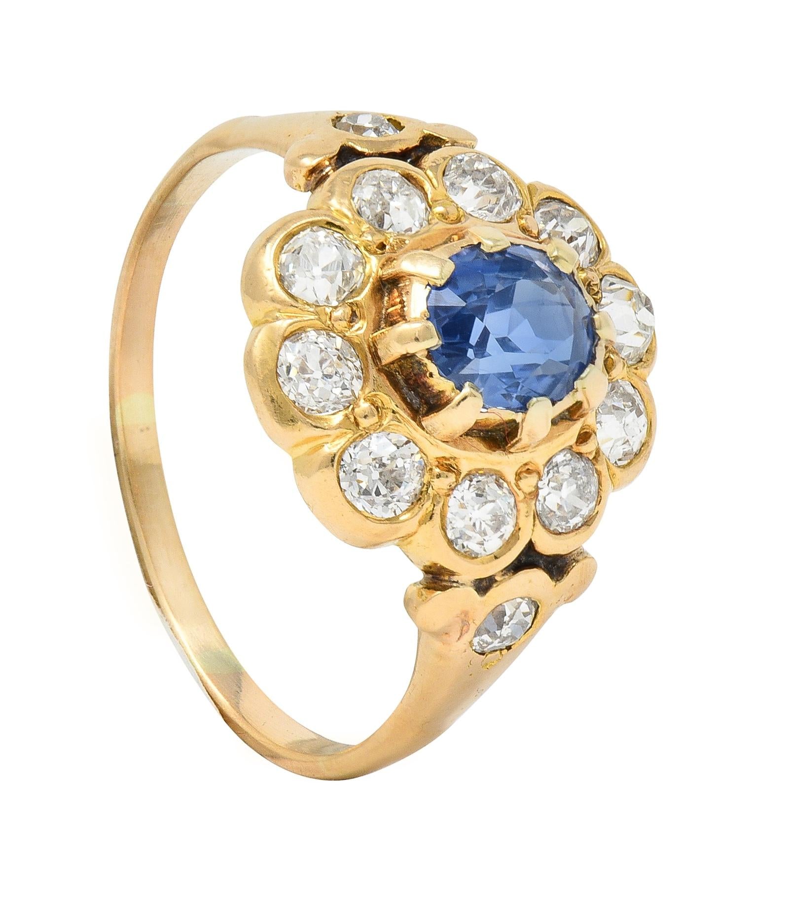 Victorian 1.37 CTW Sapphire Diamond 14 Karat Yellow Gold Antique Halo Ring