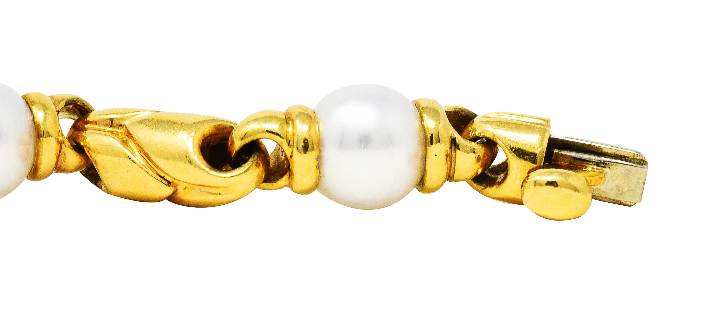 1980's Bulgari Pearl 18 Karat Yellow Gold Passo Doppio Link Vintage Bracelet Wilson's Estate Jewelry