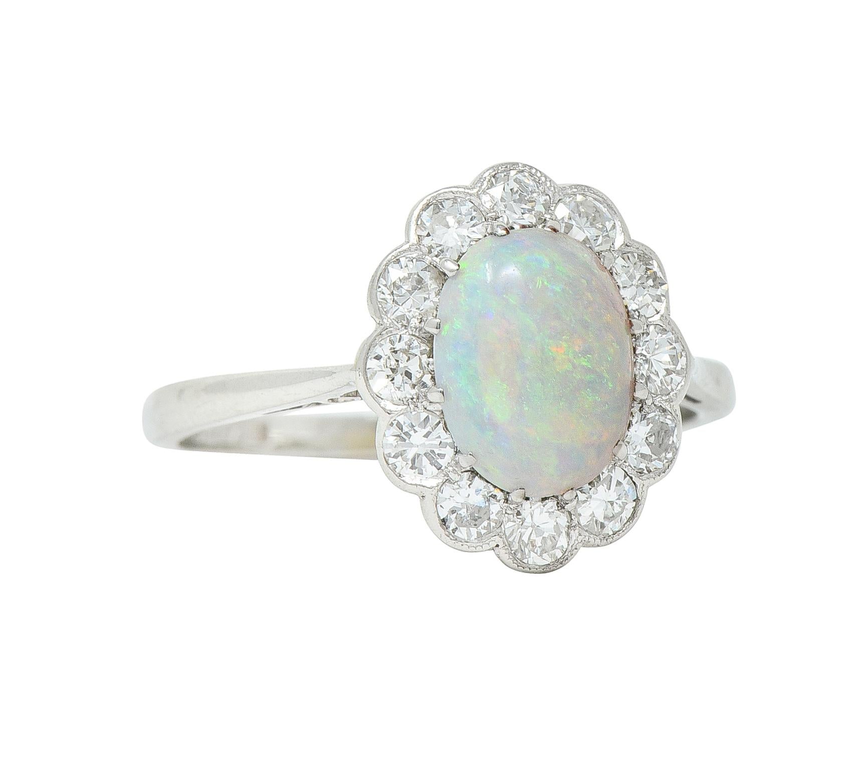 Edwardian 0.60 CTW Opal Diamond Platinum 18 Karat Gold Antique Halo Ring