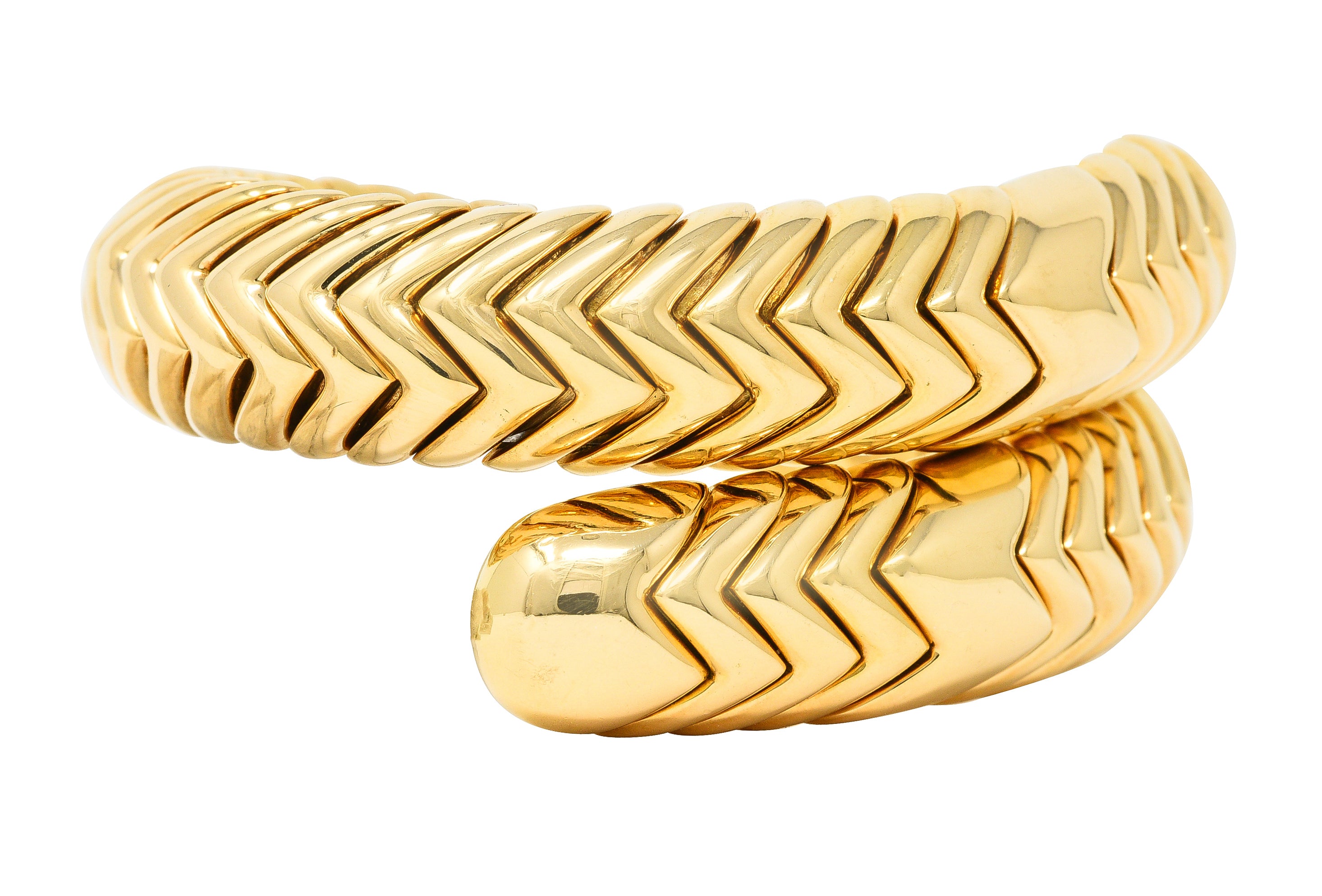 Bulgari 1990's 18 Karat Yellow Gold Chevron Spiga Wrap Vintage Bangle Bracelet Wilson's Estate Jewelry