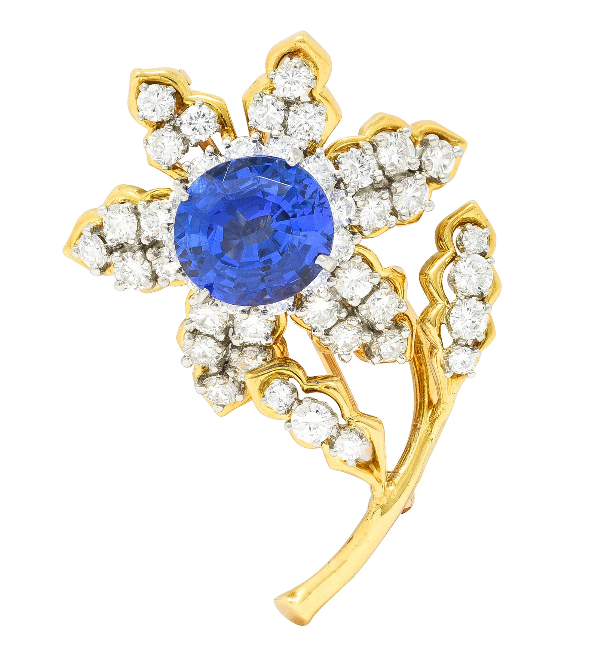 Tiffany & Co. 10.23 CTW Step Cut Tanzanite Transitional Cut Diamonds Platinum 18 Karat Yellow Gold Clematis Flower Vintage Brooch Wilson's Estate Jewelry