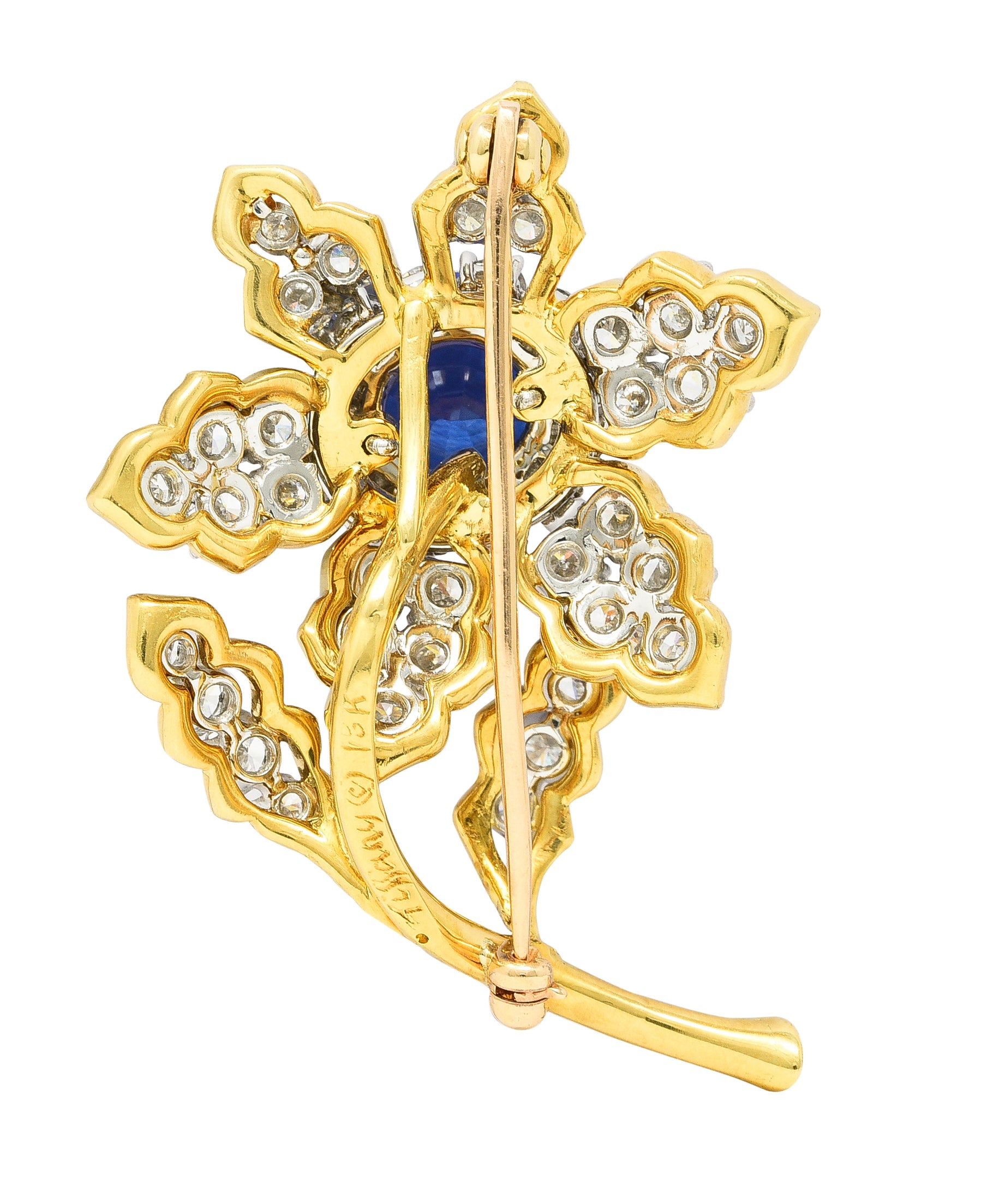 Tiffany & Co. 10.23 CTW Step Cut Tanzanite Transitional Cut Diamonds Platinum 18 Karat Yellow Gold Clematis Flower Vintage Brooch Wilson's Estate Jewelry