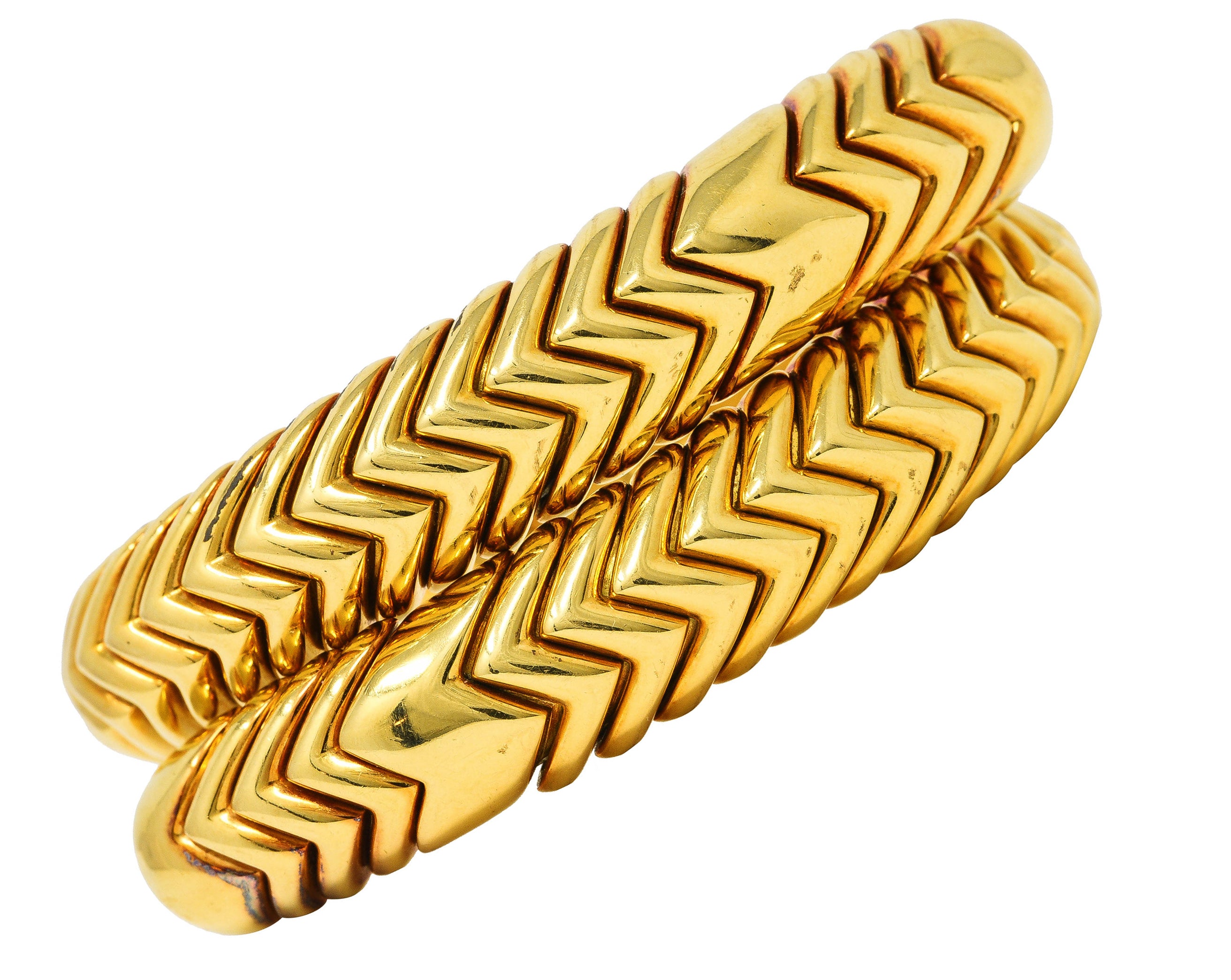 Bulgari 1990's 18 Karat Yellow Gold Chevron Spiga Wrap Vintage Bangle Bracelet Wilson's Estate Jewelry