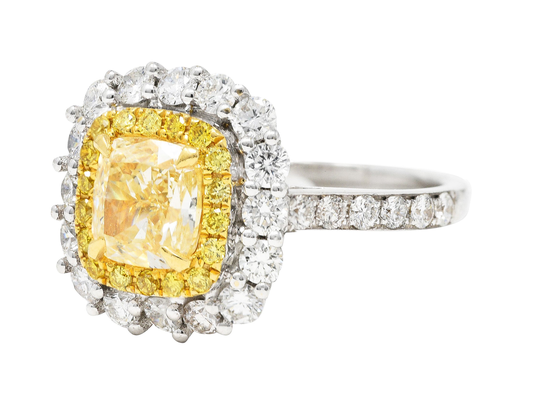 Contemporary 2.16 CTW Cushion Cut Fancy Yellow Diamond Two-Tone 18 Karat Gold Double Halo Gemstone Ring Wilson's Estate Jewelry