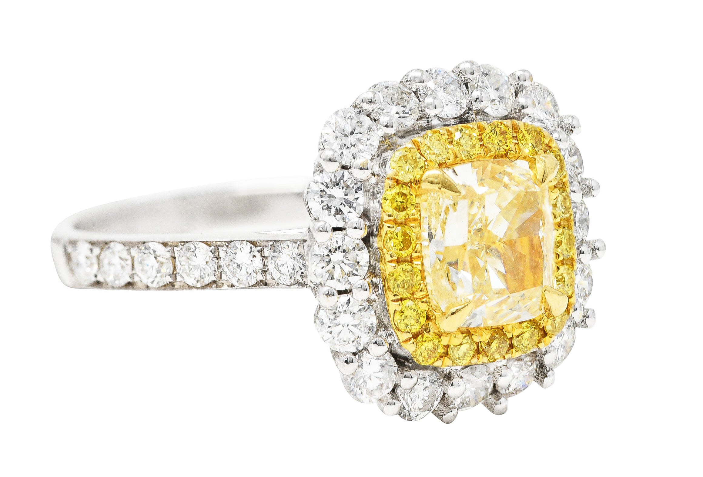 Contemporary 2.16 CTW Cushion Cut Fancy Yellow Diamond Two-Tone 18 Karat Gold Double Halo Gemstone Ring Wilson's Estate Jewelry