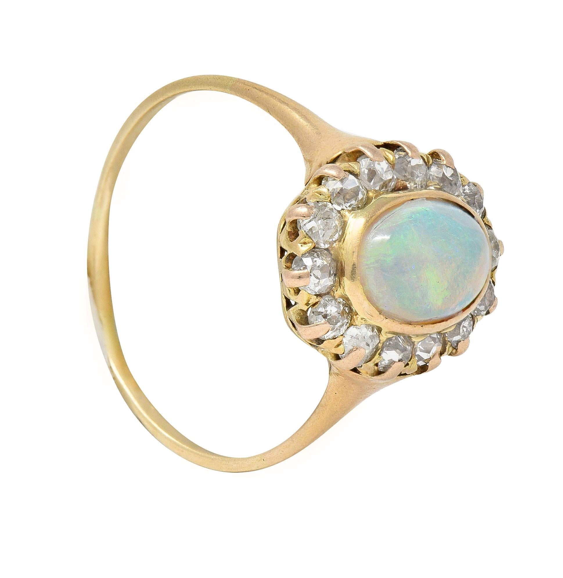 Victorian 0.86 CTW Opal Cabochon Diamond 14 Karat Yellow Gold Antique Halo Ring