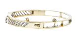 Edwardian 1.04 CTW French Cut Diamond Platinum-Topped 14 Karat Yellow Gold Bow Antique Bangle Bracelet Wilson's Estate Jewelry