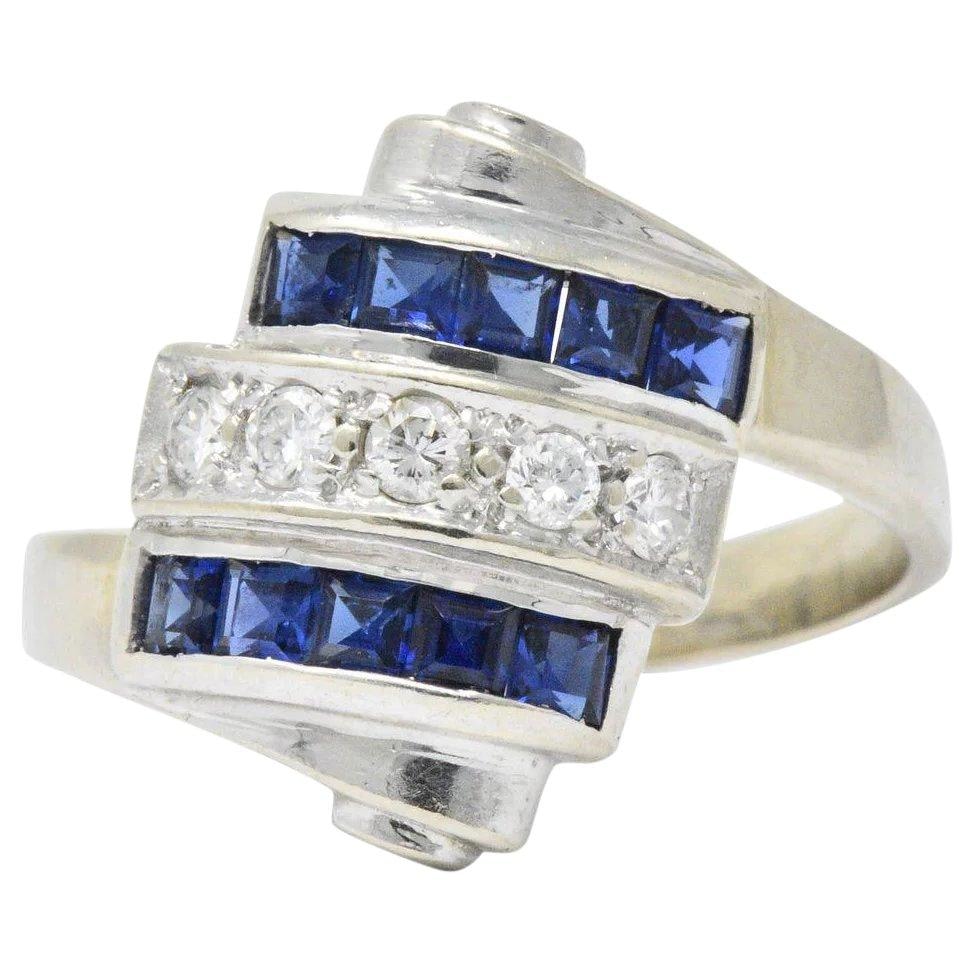 Retro 0.80 CTW Diamond Sapphire 14 Karat White Gold Scrolled Bypass Ring Wilson's Estate Jewelry