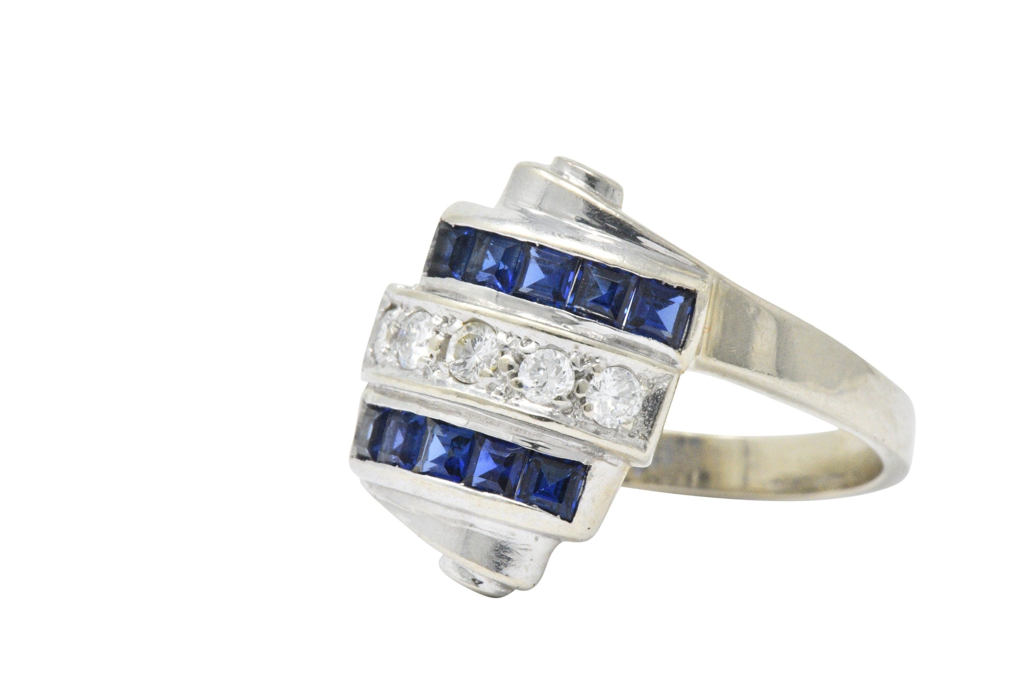 Retro 0.80 CTW Diamond Sapphire 14 Karat White Gold Scrolled Bypass Ring Wilson's Estate Jewelry